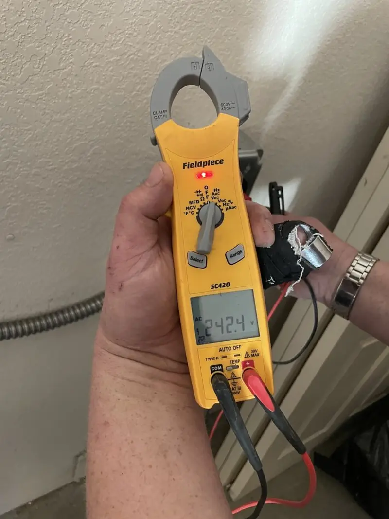 Voltage testing with clamp meter during Generator Installation in Victoria